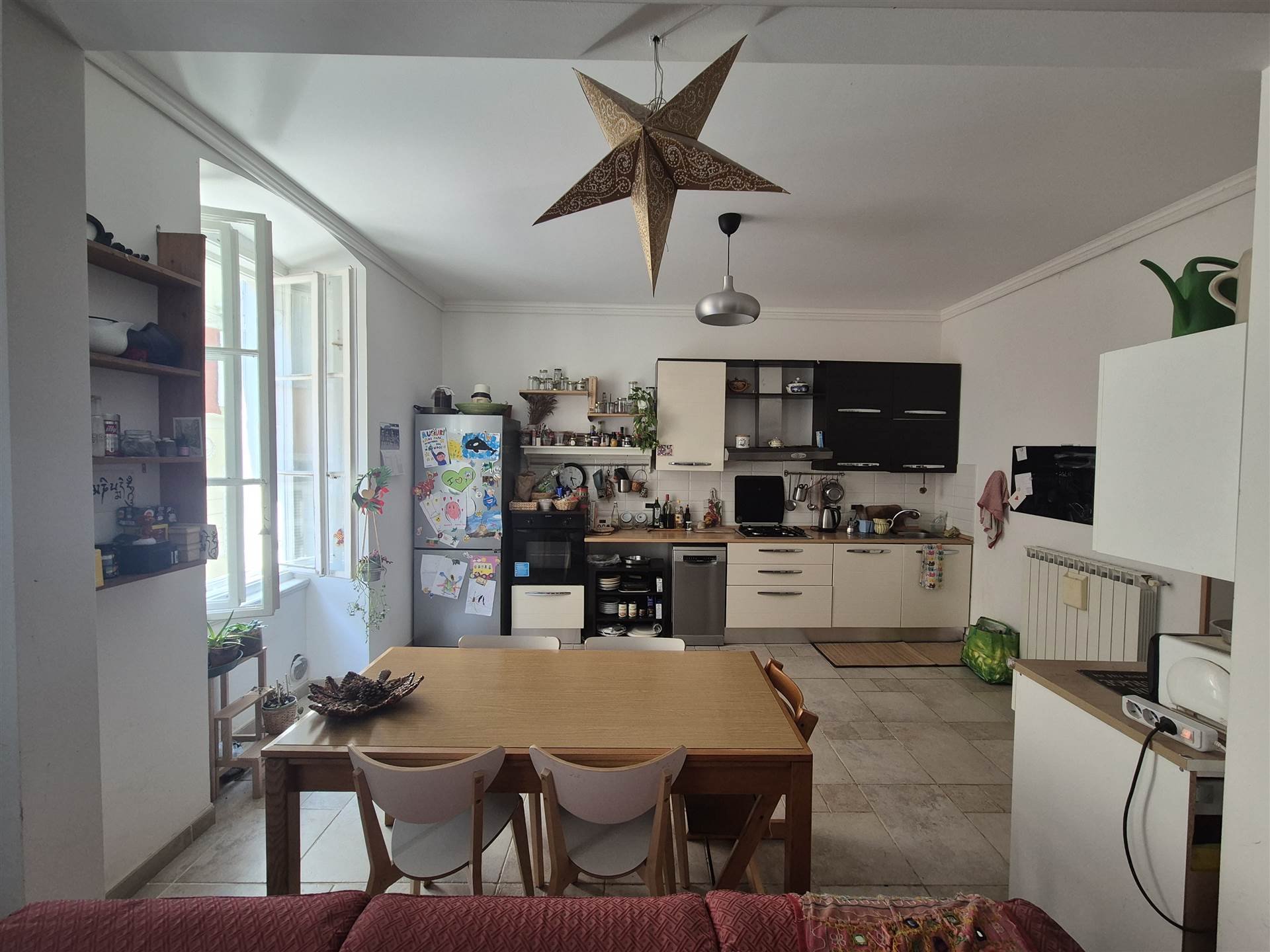 Cucina e zona pranzo di un'abitazione valutata a Trieste